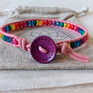 Pink leather bracelet with rainbow coloured glass beads, Pride bracelet 
