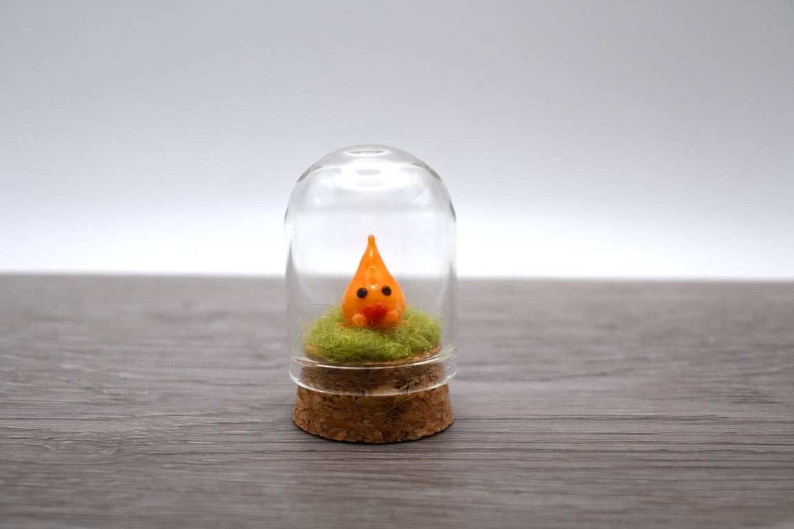 small glass wisp keepsake figure