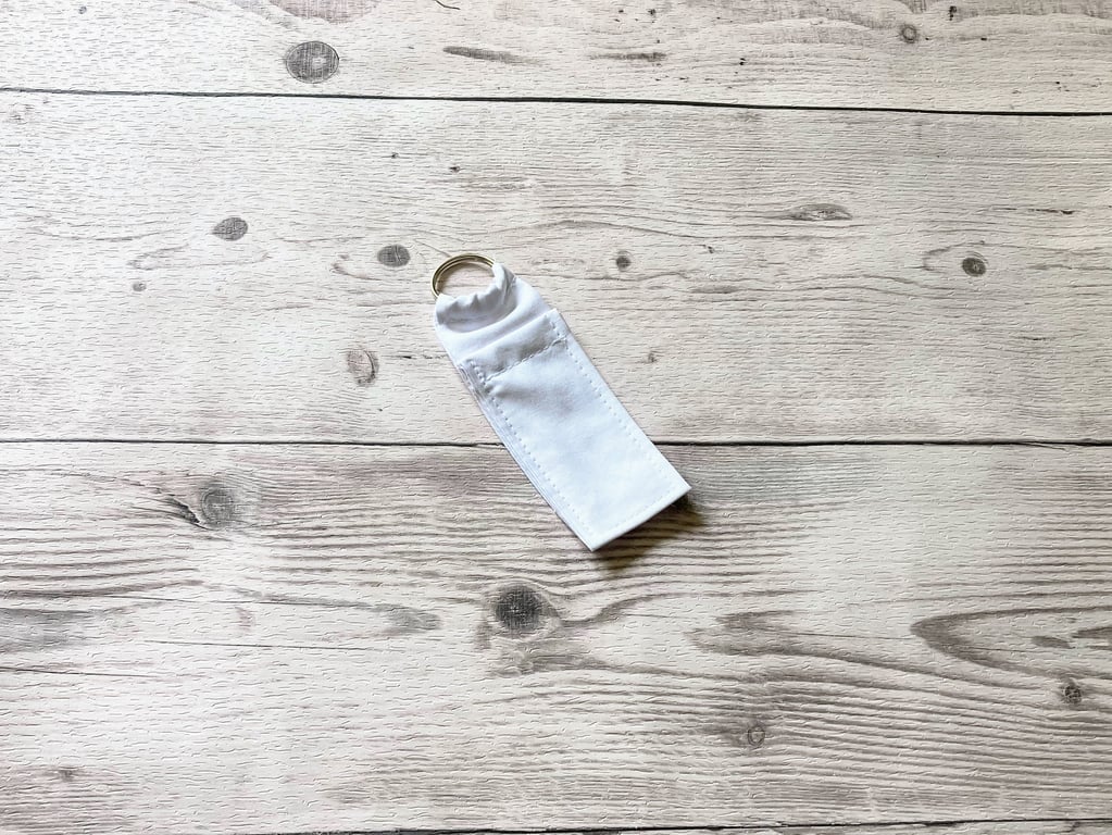 Plain white lip balm holder keyring. Cotton fabric lipstick keychain. 