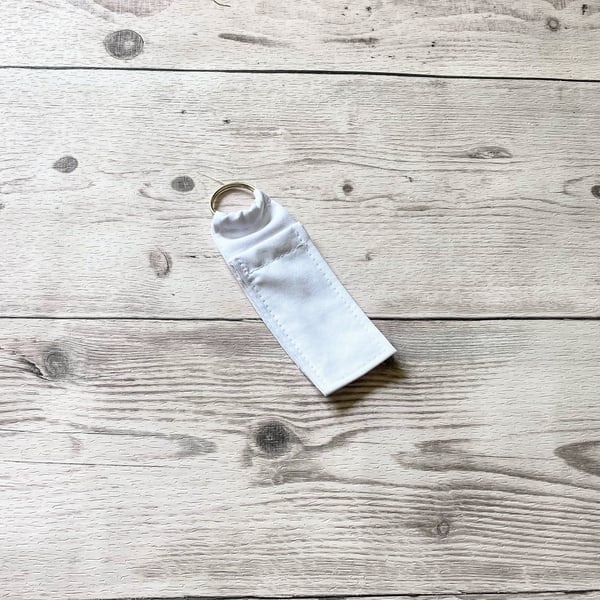 Plain white lip balm holder keyring. Cotton fabric lipstick keychain. 