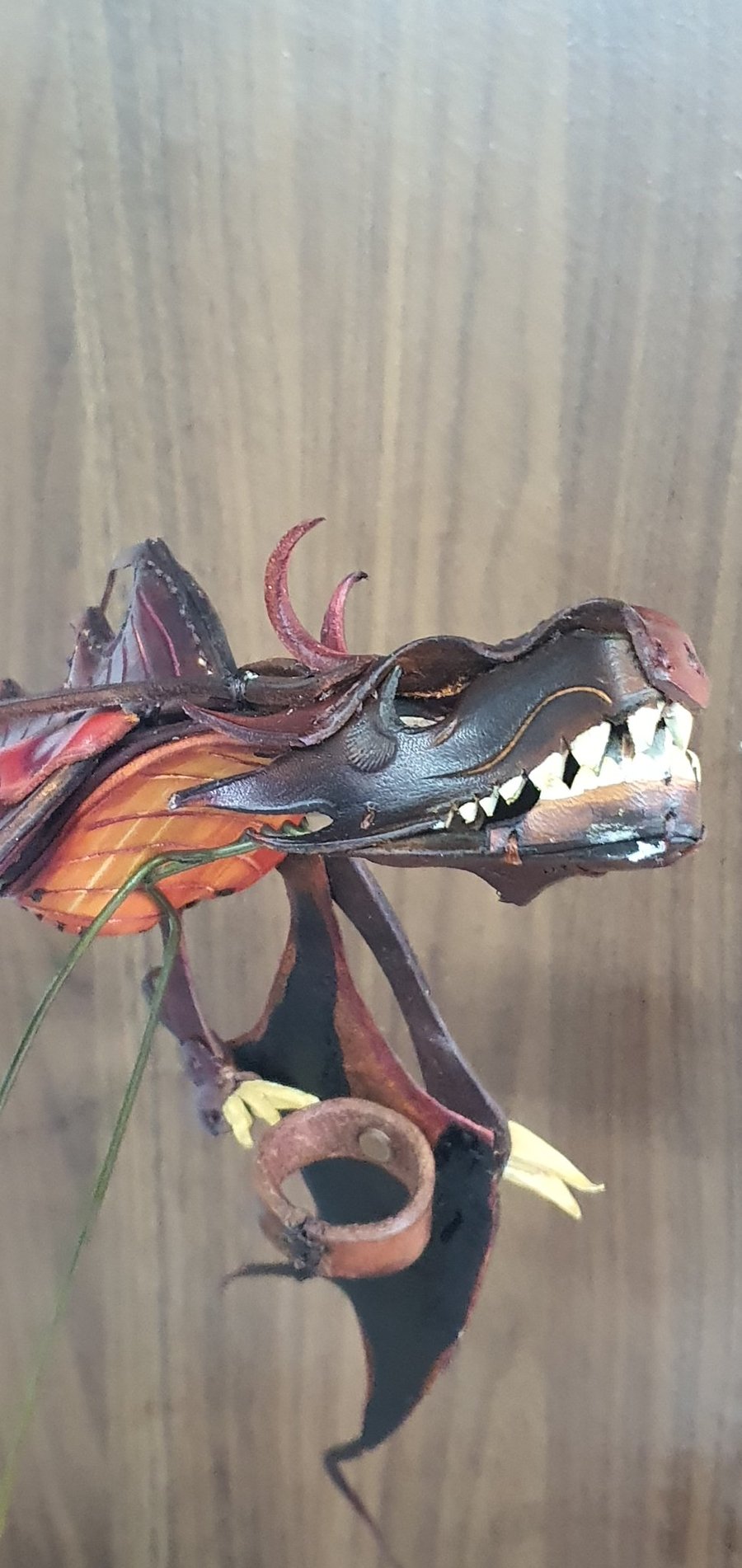 Draco.  Leather hand puppet.