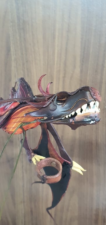 Draco.  Leather hand puppet.