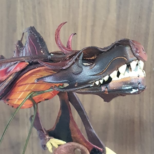 Draco.  Leather hand puppet.