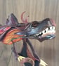 Draco.  Leather hand puppet.
