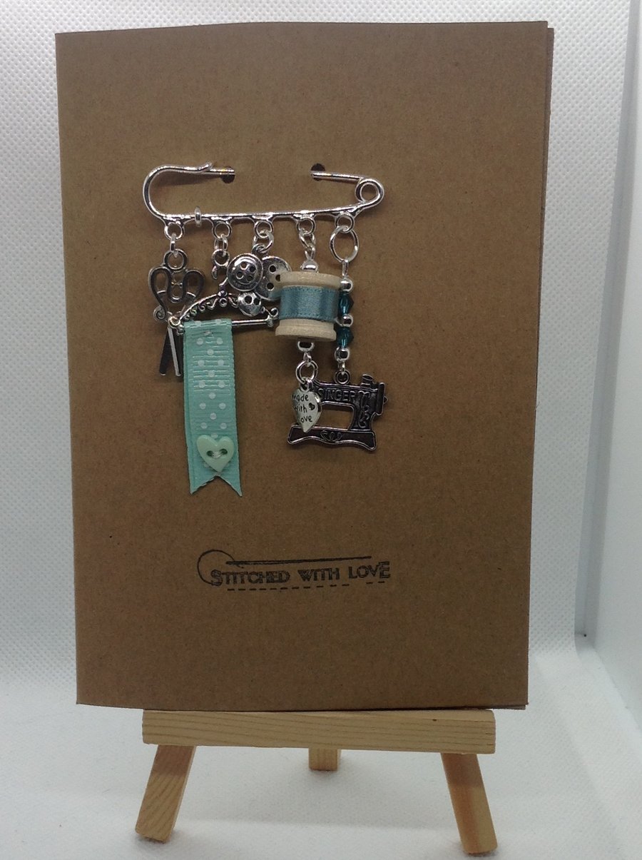 Hand made kilt pin brooch attached to an A6 Kraft card