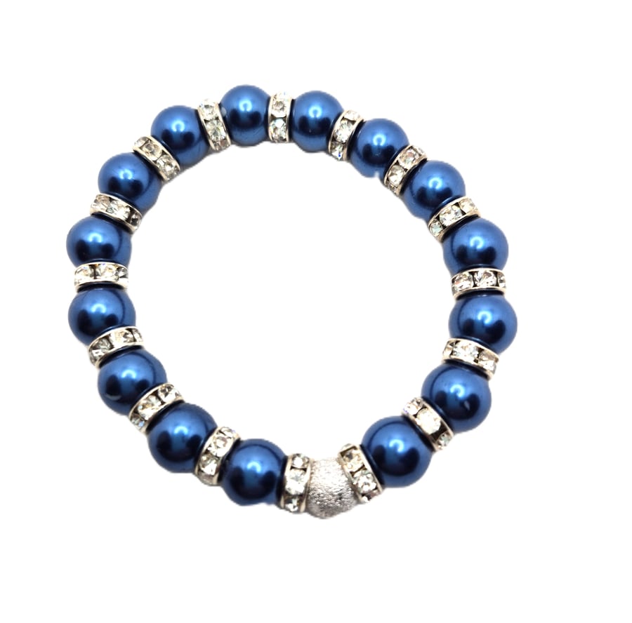 Blue faux pearl stretchy with crystal rondelles and a stardust bead