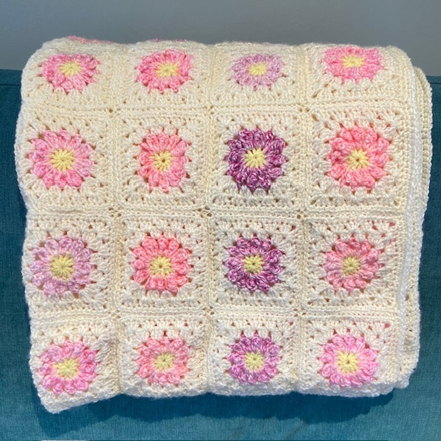 Crochet blanket in warm white, pink & lemon