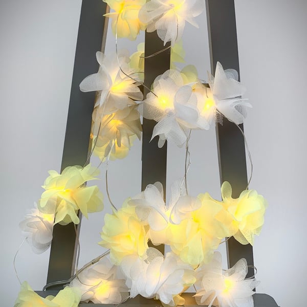20 chiffon flower Fairy Lights in lemon and white.