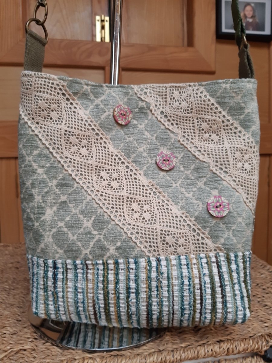Green and cream lace bag