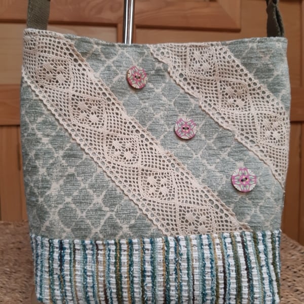 Green and cream lace bag