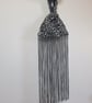 Snow leopard print faux fur fabric Japanese Knot bag with 48cm black tassel trim - Image 2