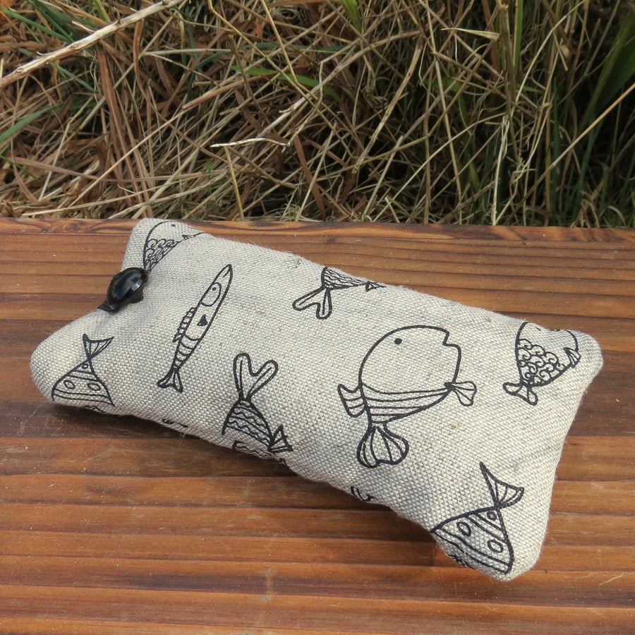 Fish.  A padded glasses sleeve with a whimsical fish design.