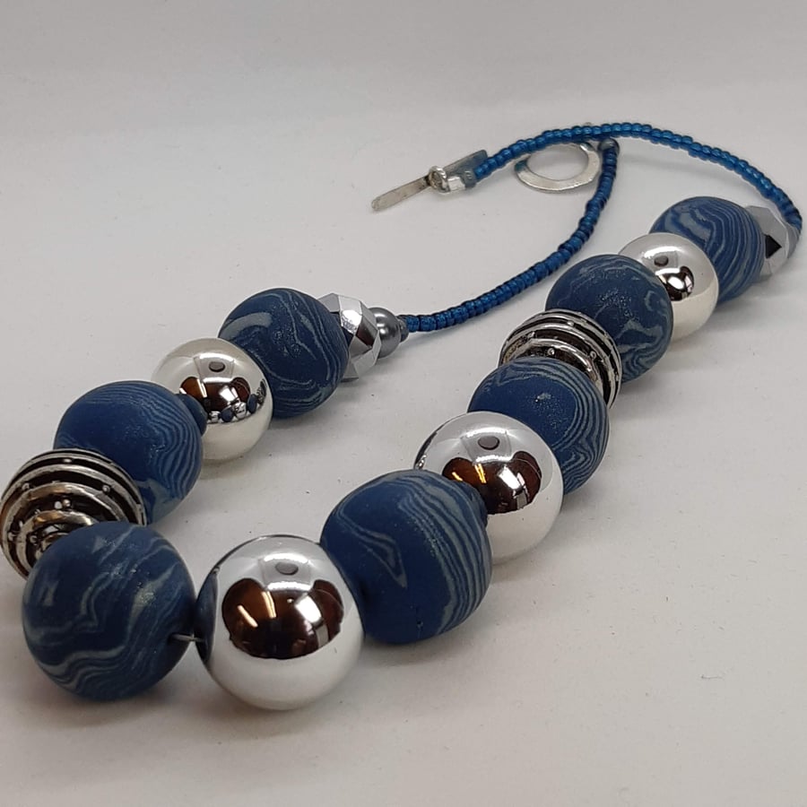 Blue and silver polymer clay necklace