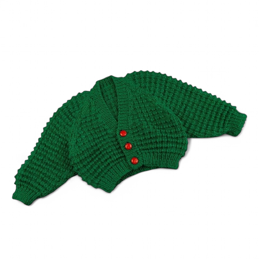 Hand knitted baby cardigan in emerald green with textured pattern  