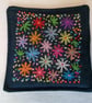 Set of four embroidered fabric coasters.  - Image 4