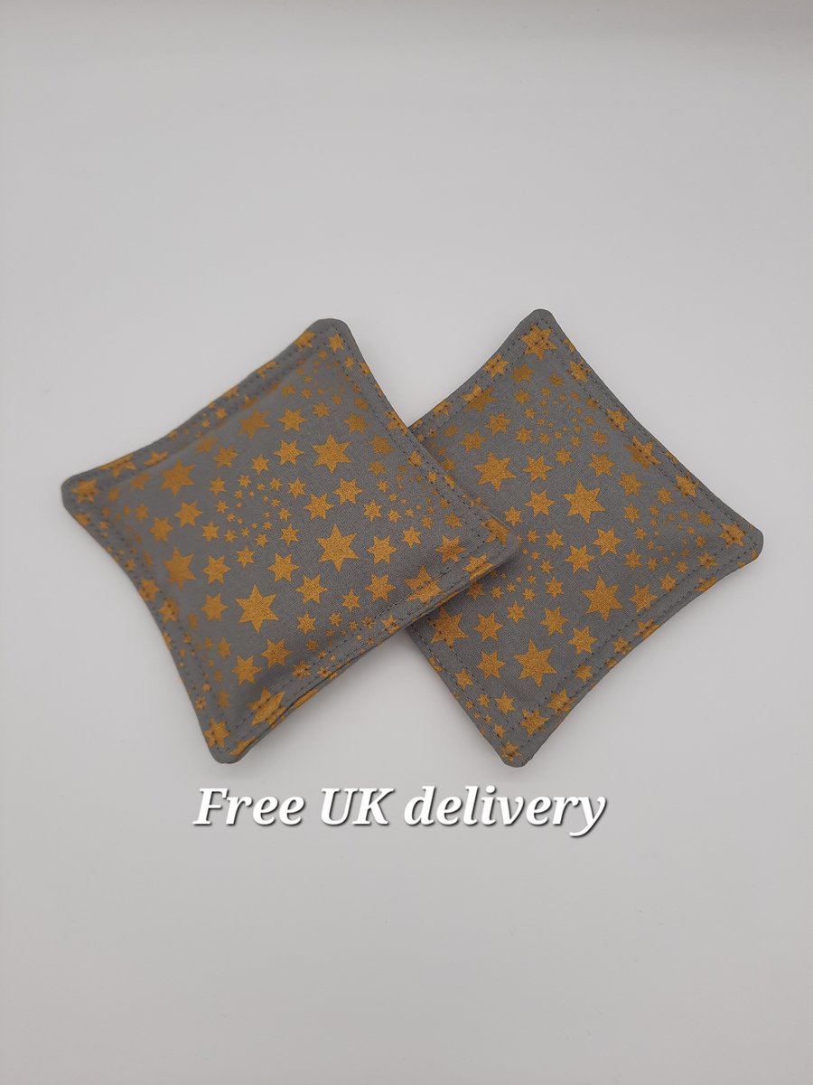 Hand warmers  - grey with gold stars.  