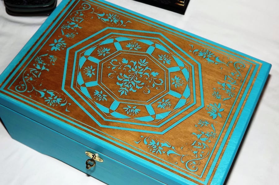 LOCKABLE TURQUOISE WOODEN BOX. INTRICATE ENGRAVED PATTERN with key on a chain.