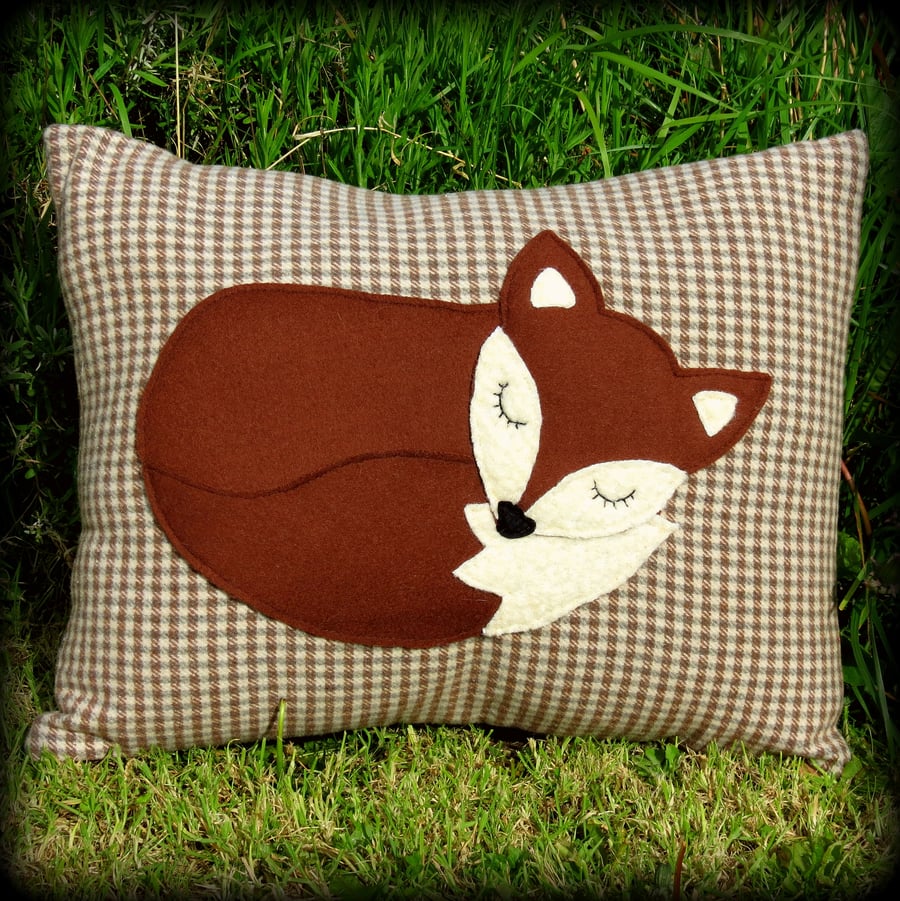 A snoozy fox cushion, complete with inner pad.  48cm x 38cm.