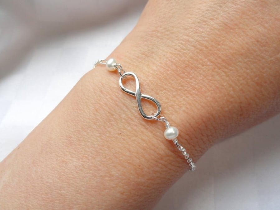 Sterling silver infinity freshwater pearl bracelet