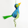 Blue felt 3D bird with hand embroidered almond blossom
