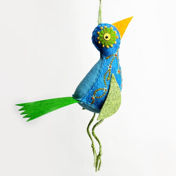 Blue felt 3D bird with hand embroidered almond blossom
