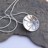 Silver flower domed disc necklace