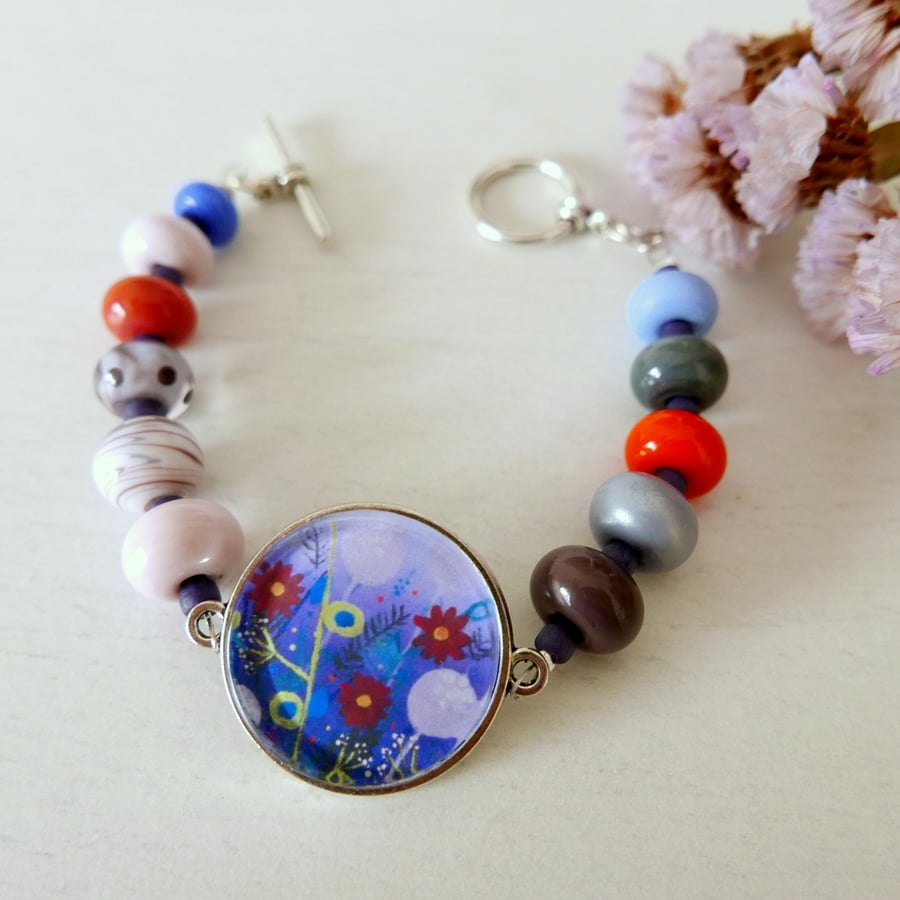 Purple Beaded Bracelet with Floral Art Pendant Connector and Lampwork Beads 