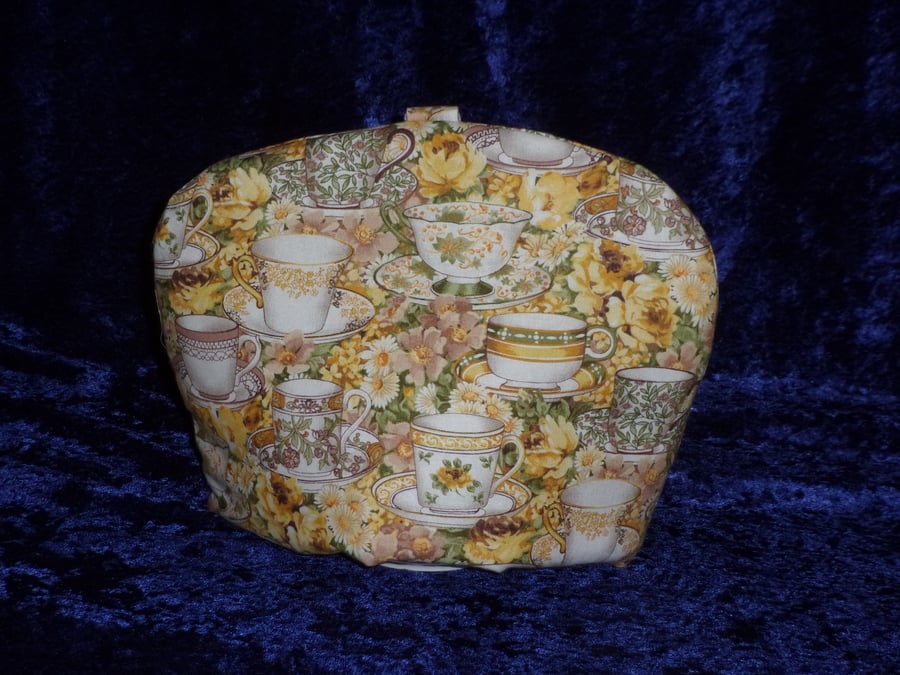 Small Tea Cosy with Cups and Saucers
