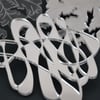 Mirrored acrylic coasters with swirl design