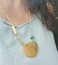 Abstract pebble pendant on glass bead necklace. - Image 5
