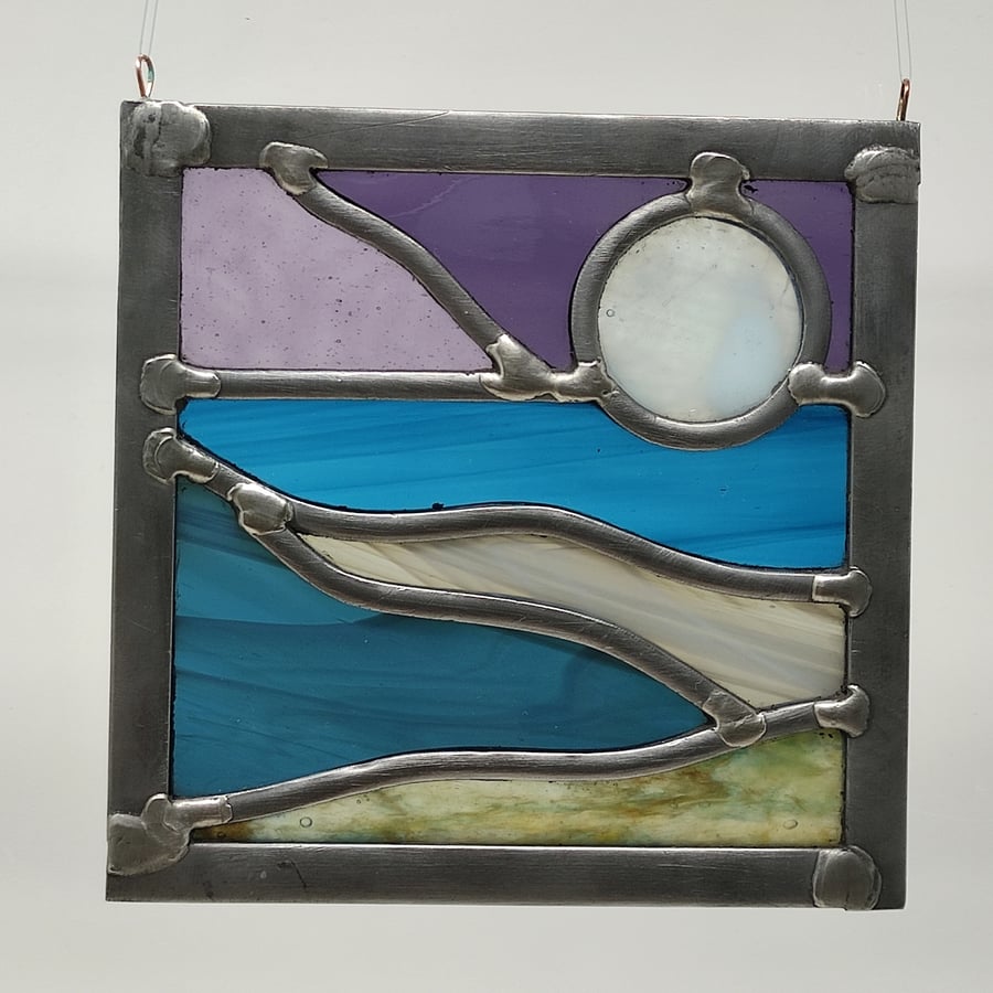 SOLD Rising moon seascape stained glass leaded hanging panel.