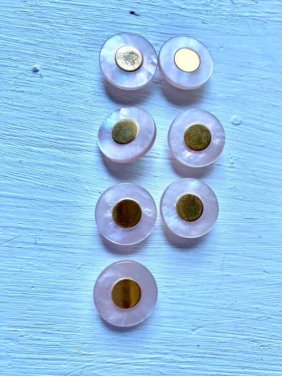 7 palest pink buttons with gold centre