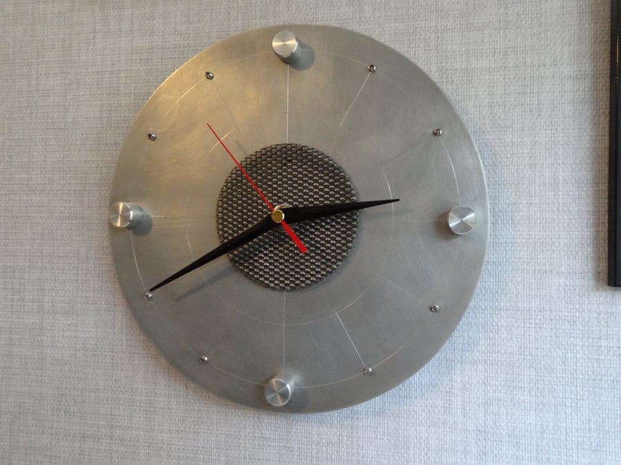 A one off industrial style aluminium wall clock
