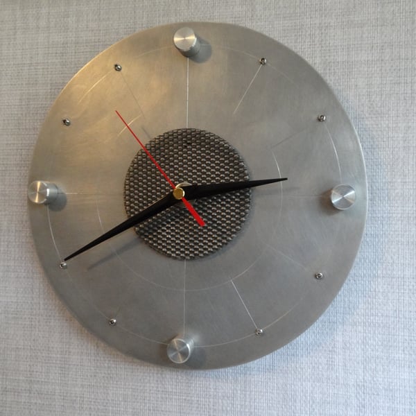 A one off industrial style aluminium wall clock