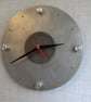 A one off industrial style aluminium wall clock