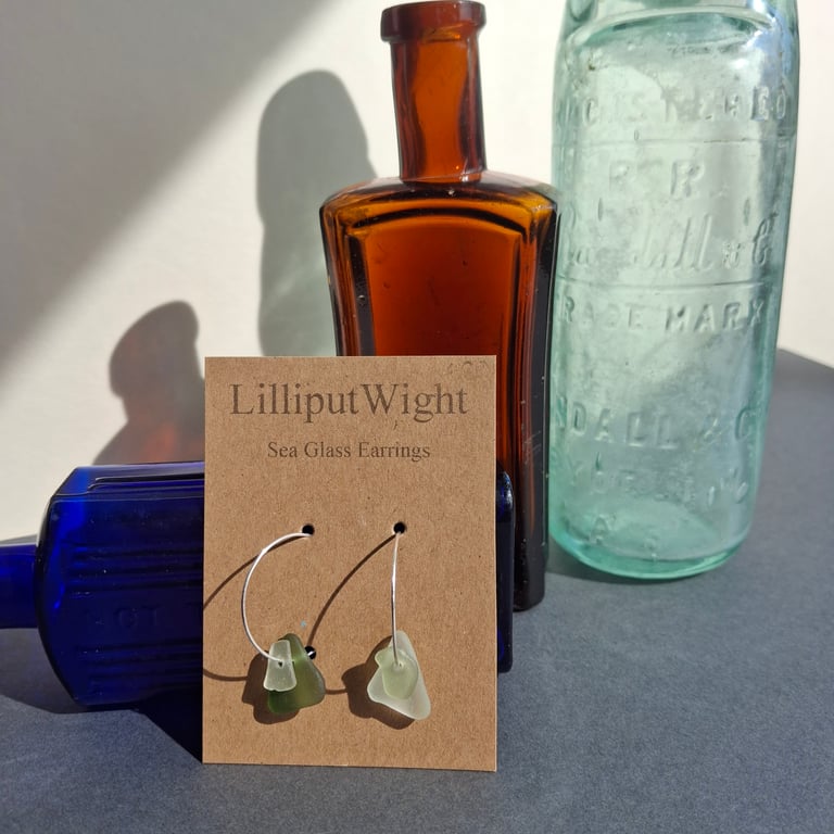 Mismatched sea foam and green coloured sea glass silver hooped earrings