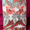 Ornate patterned notebook in orange, white and turqouise