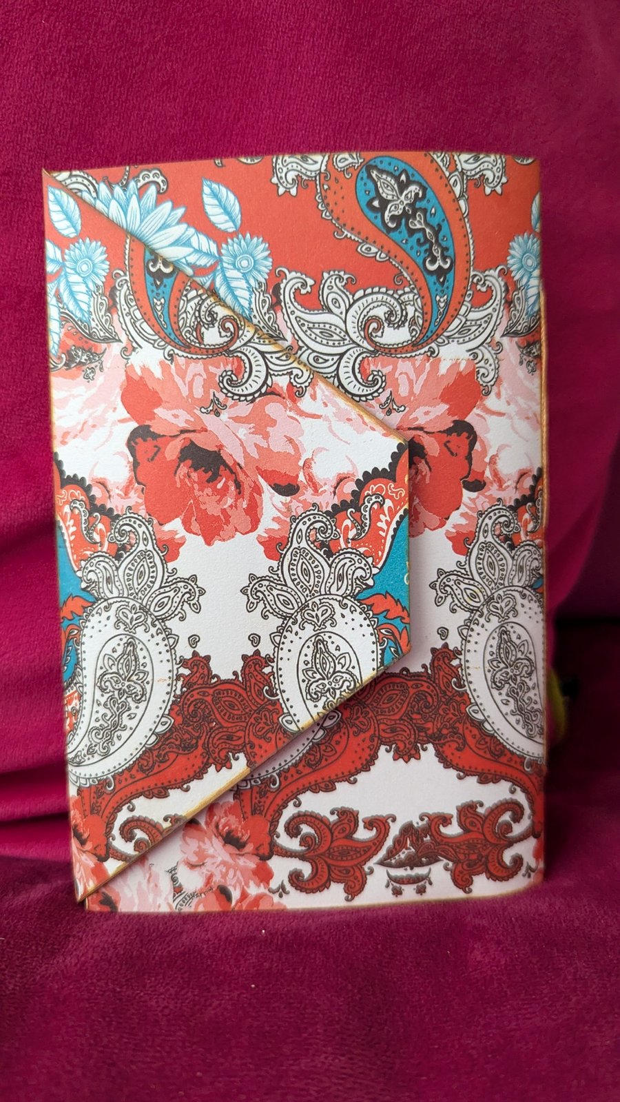 Ornate patterned notebook in orange, white and turqouise