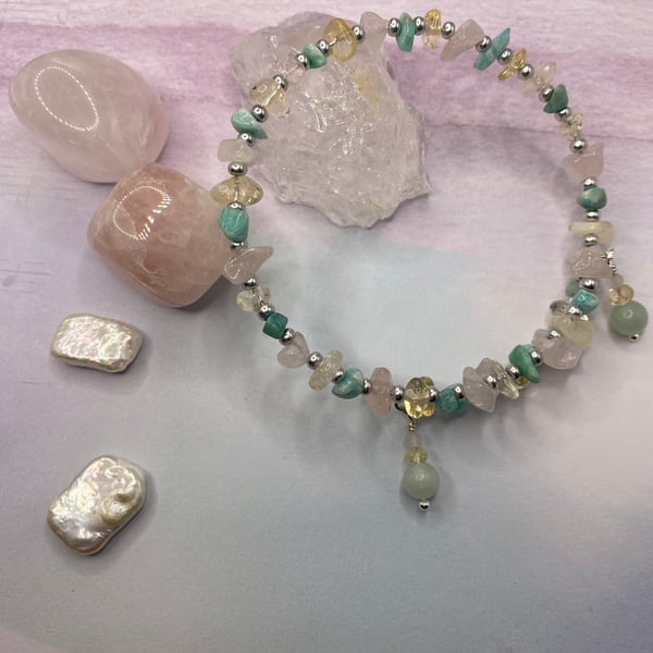 Memory wire bangle with chips of citrine, rose quartz and amazonite