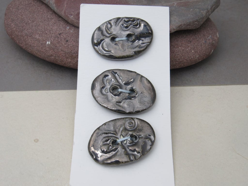 3 Medium Oval Metallic Silver Brocade Pattern Ceramic Buttons