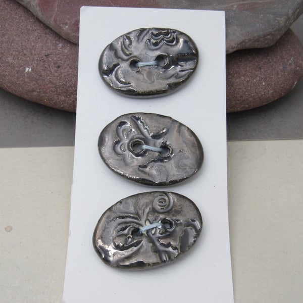 3 Medium Oval Metallic Silver Brocade Pattern Ceramic Buttons