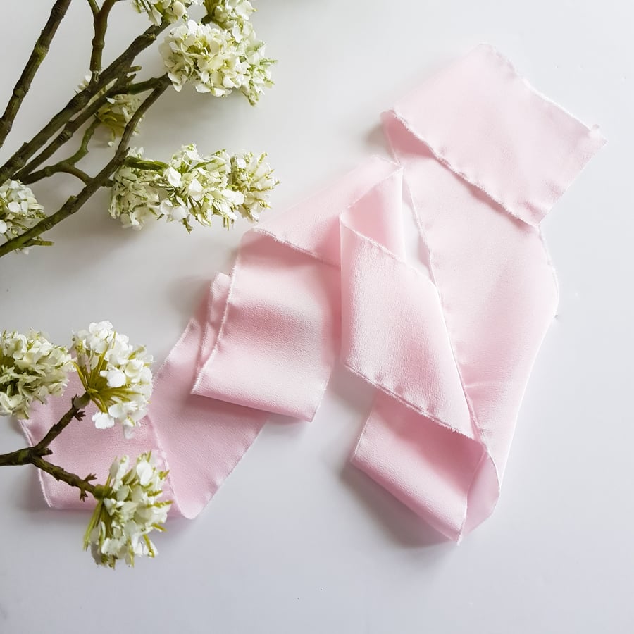 Light pink 100% silk crepe de chine ribbon with raw edge