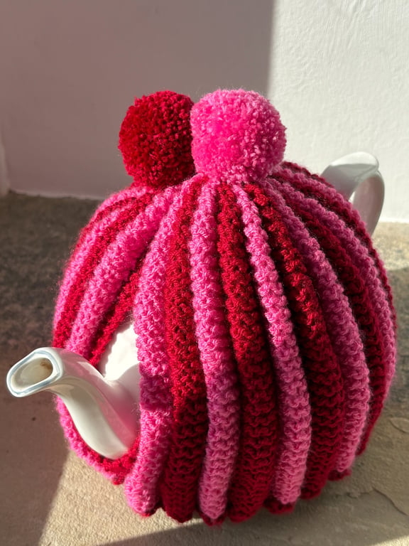 Red and pink retro tea cosy