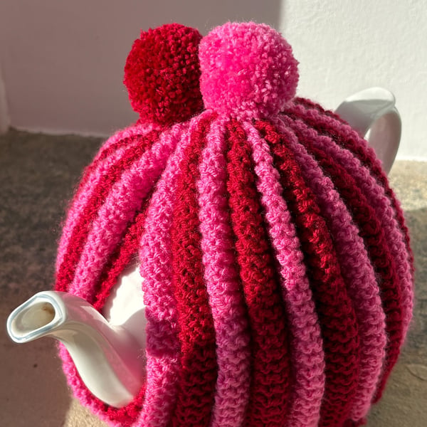 Red and pink retro tea cosy