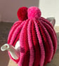 Red and pink retro tea cosy