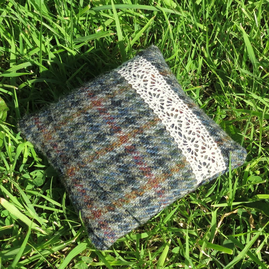 A pin cushion made from a vintage Harris tweed wool.