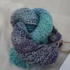 40% silk, 60% wool 50g hand-dyed yarn "ocean view" in blue, purple and turquiose