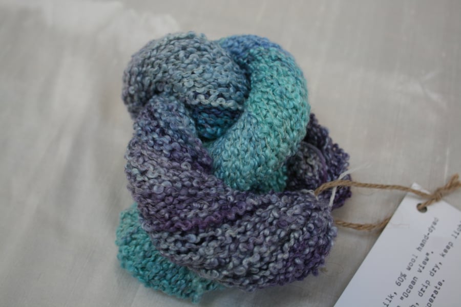 40% silk, 60% wool 50g hand-dyed yarn "ocean view" in blue, purple and turquiose