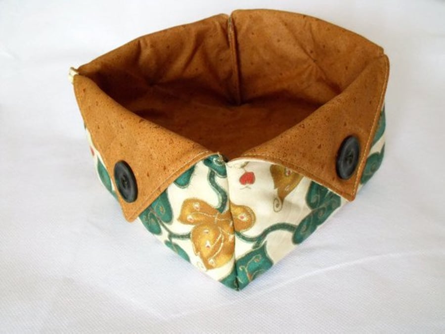 folded fabric storage tub for your bits and bobs, leaf print fabric, tan