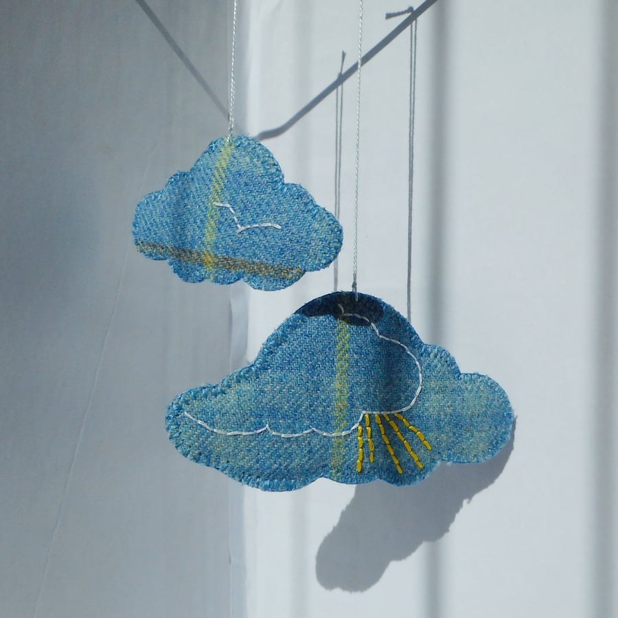 2 cloud shaped hand embroidered hanging ornaments, light blue wool